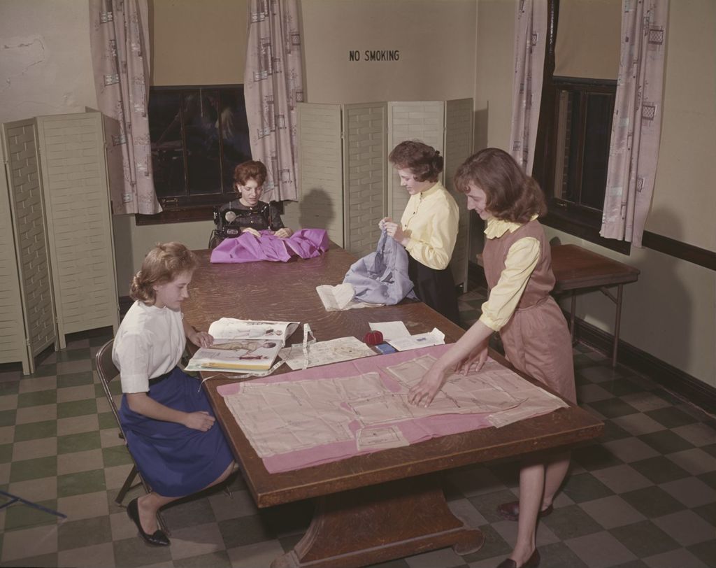 Women and girls sewing clothes