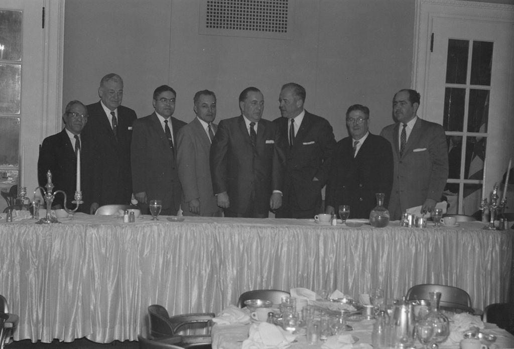 Miniature of Richard J. Daley with others at a banquet
