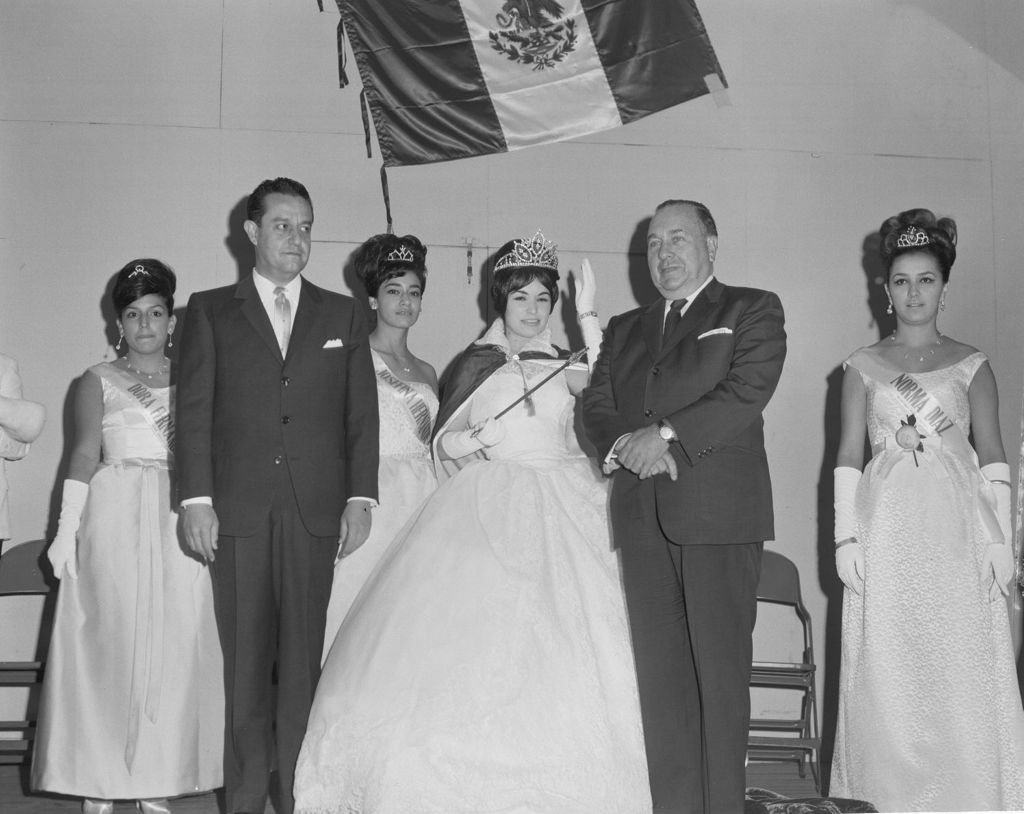 Miniature of Richard J. Daley with pageant queen and contestants