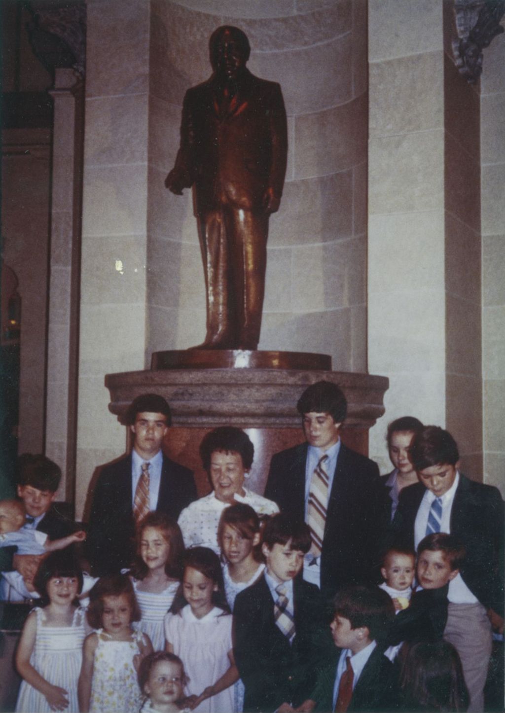 Miniature of Eleanor Daley and Daley grandchildren gathered near the Richard J. Daley statue