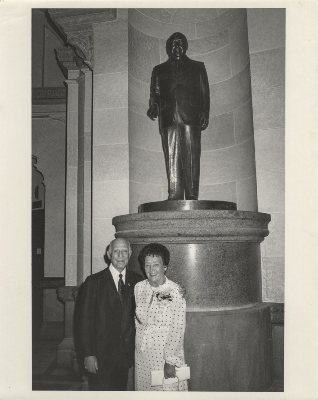Miniature of Judge Marovitz and Eleanor Daley in front of the Richard J. Daley statue