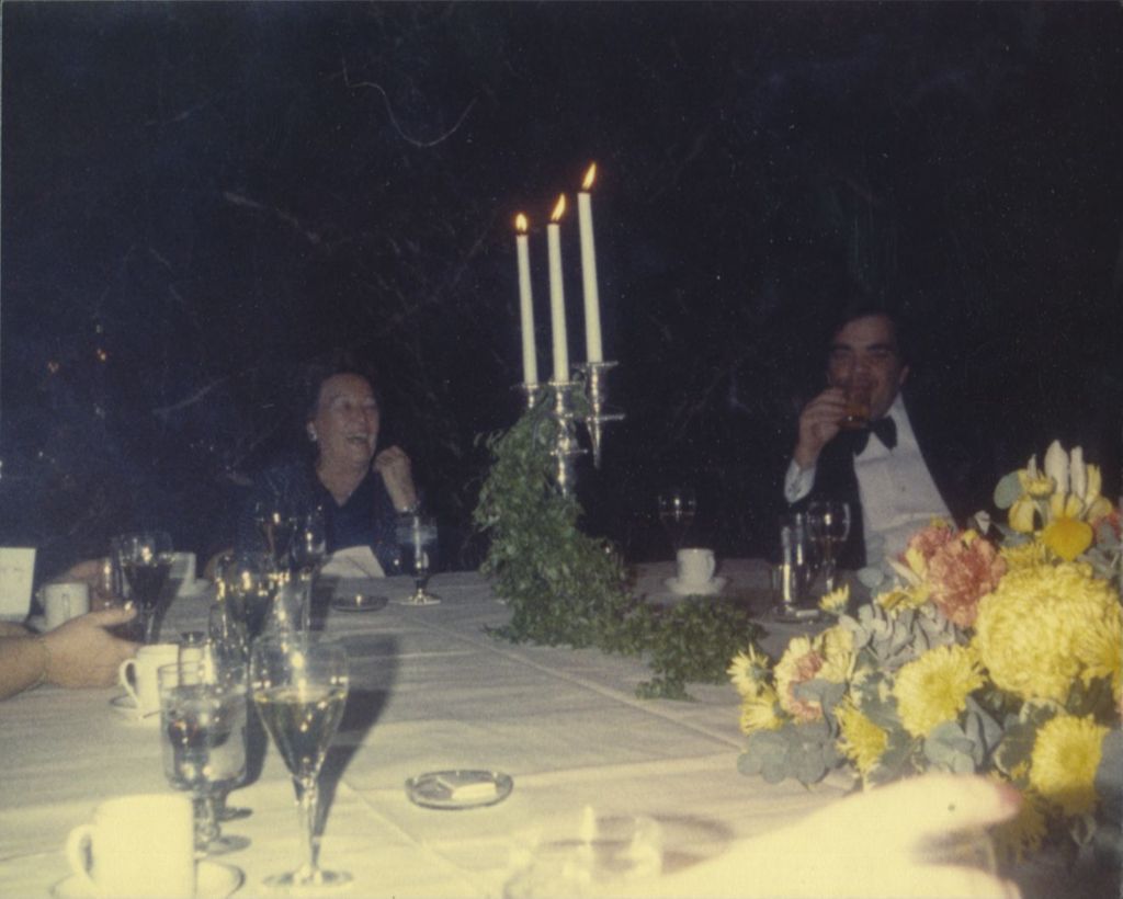 Eleanor Daley and John Daley seated at a banquet table