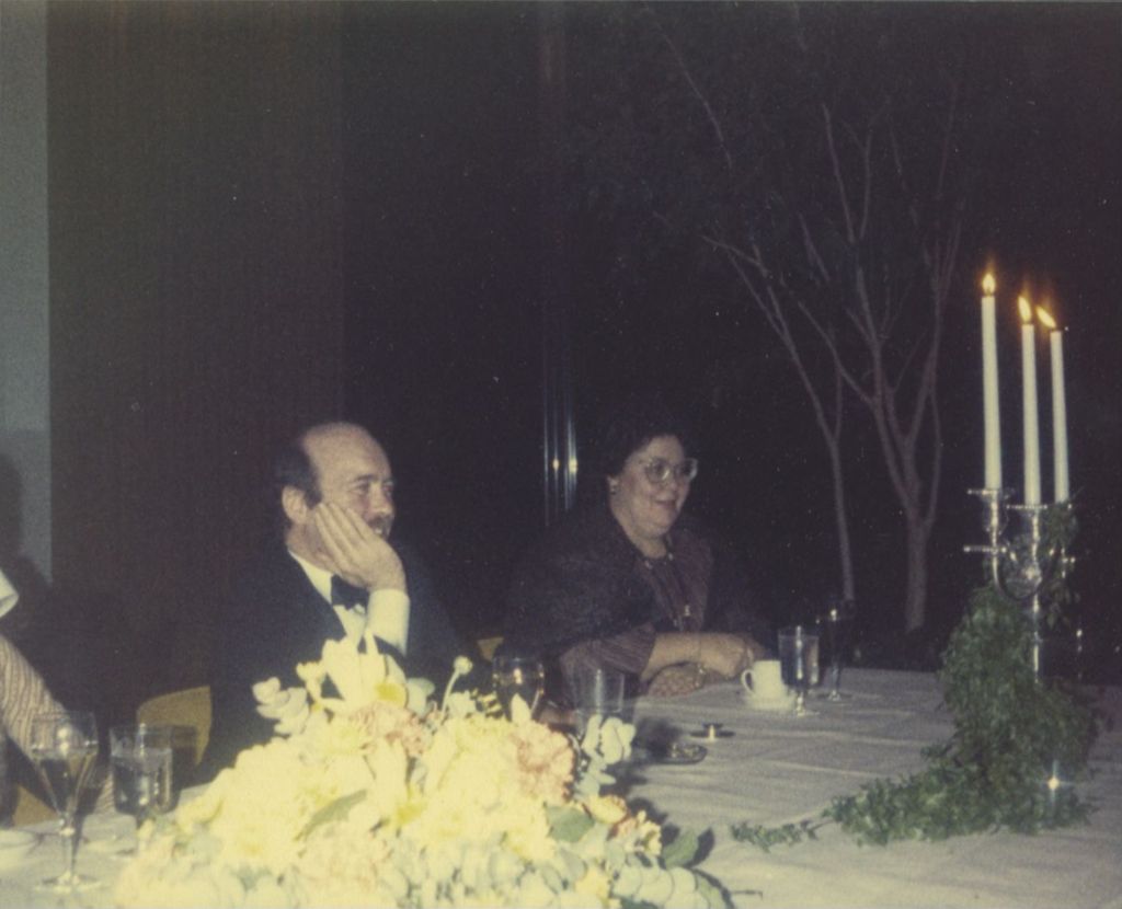 Miniature of Michael Daley and Patricia Daley seated a banquet table