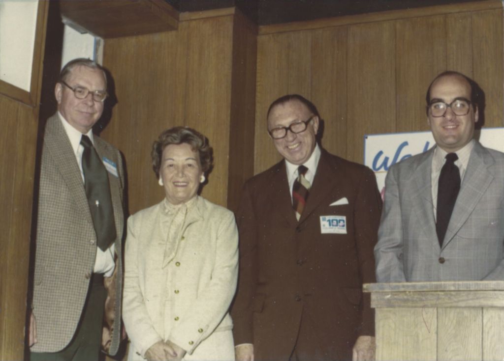 Eleanor and William Daley with two men