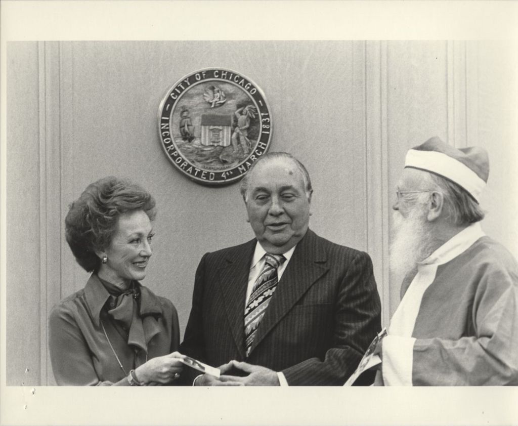 Mary Edgren, Richard J. Daley, and Santa Claus at Christmas Seal Campaign Proclamation