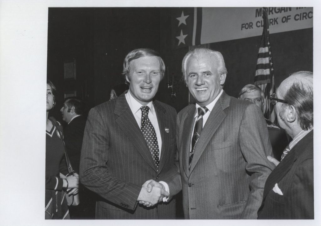 Miniature of Neil Hartigan shaking hands with man at a Democratic Club of Winnetka event