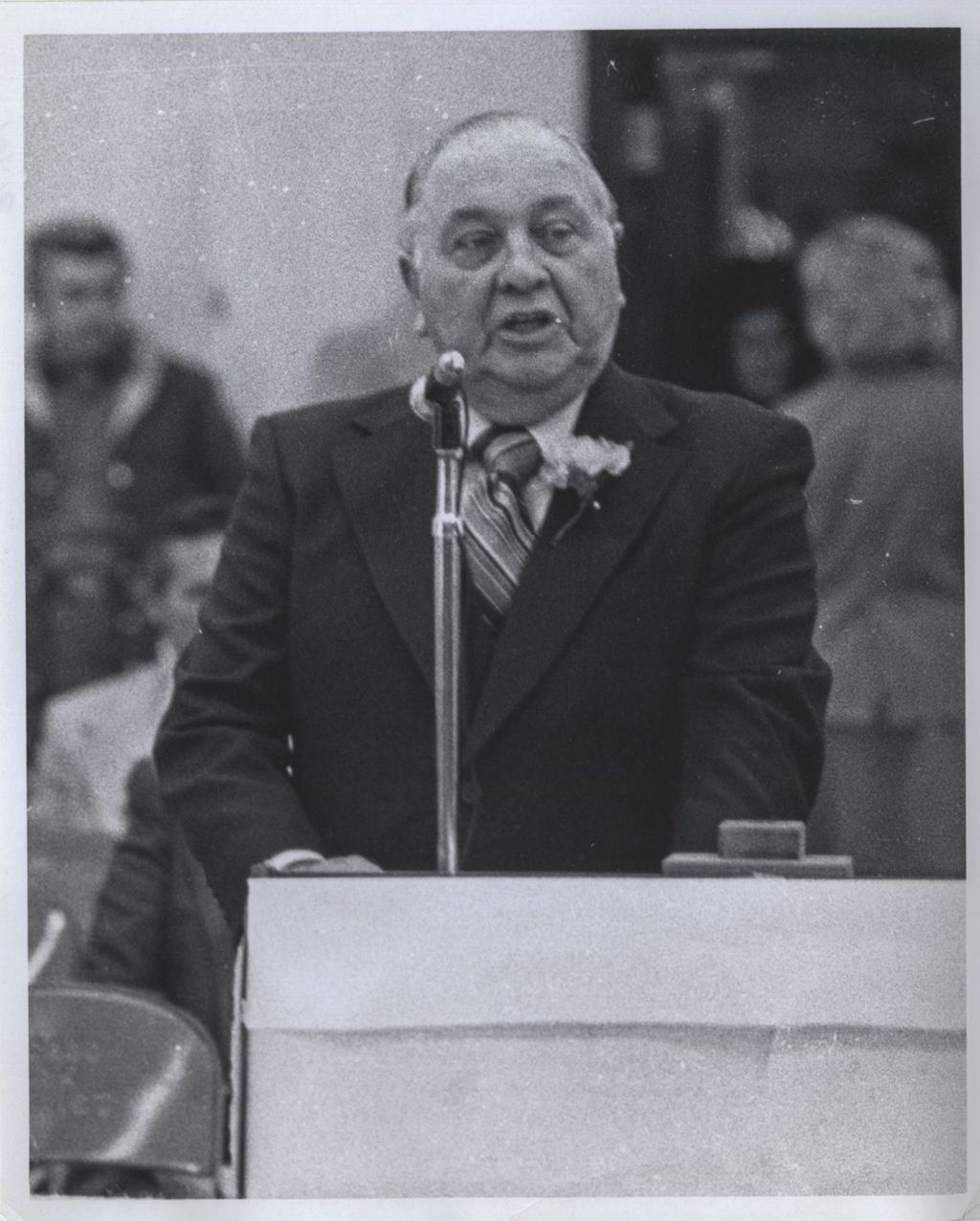 Miniature of Richard J. Daley speaking at a podium on his last day of life