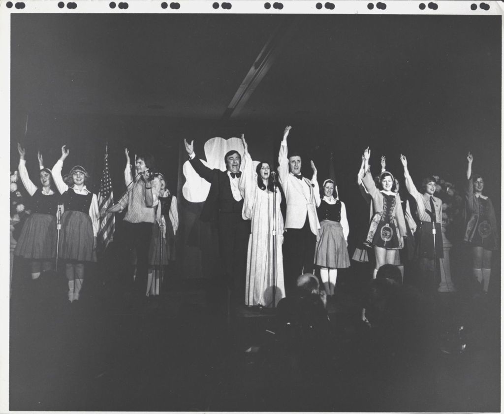 Group of musicians and dancers performing