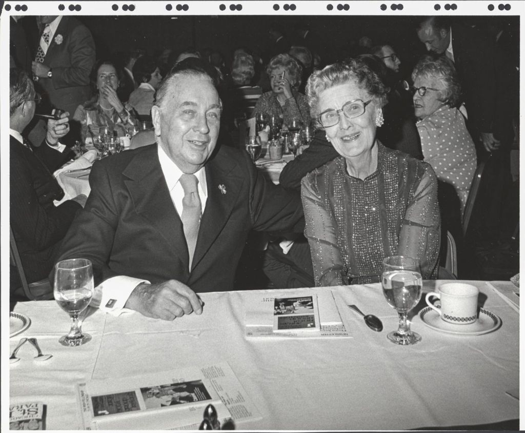 Richard J. Daley and a woman at a banquet