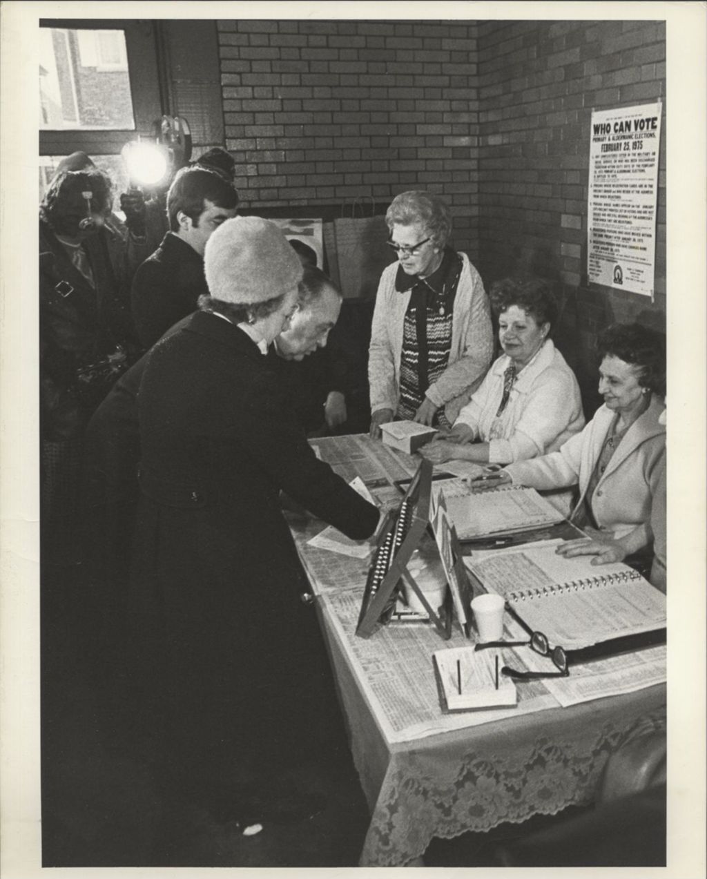 Miniature of Eleanor and Richard J. Daley at the voter registration table on voting day