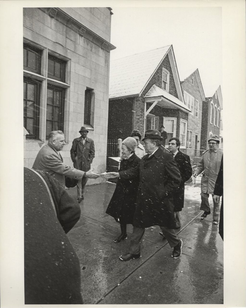Richard J. Daley on his way to the polls with Eleanor and John Daley