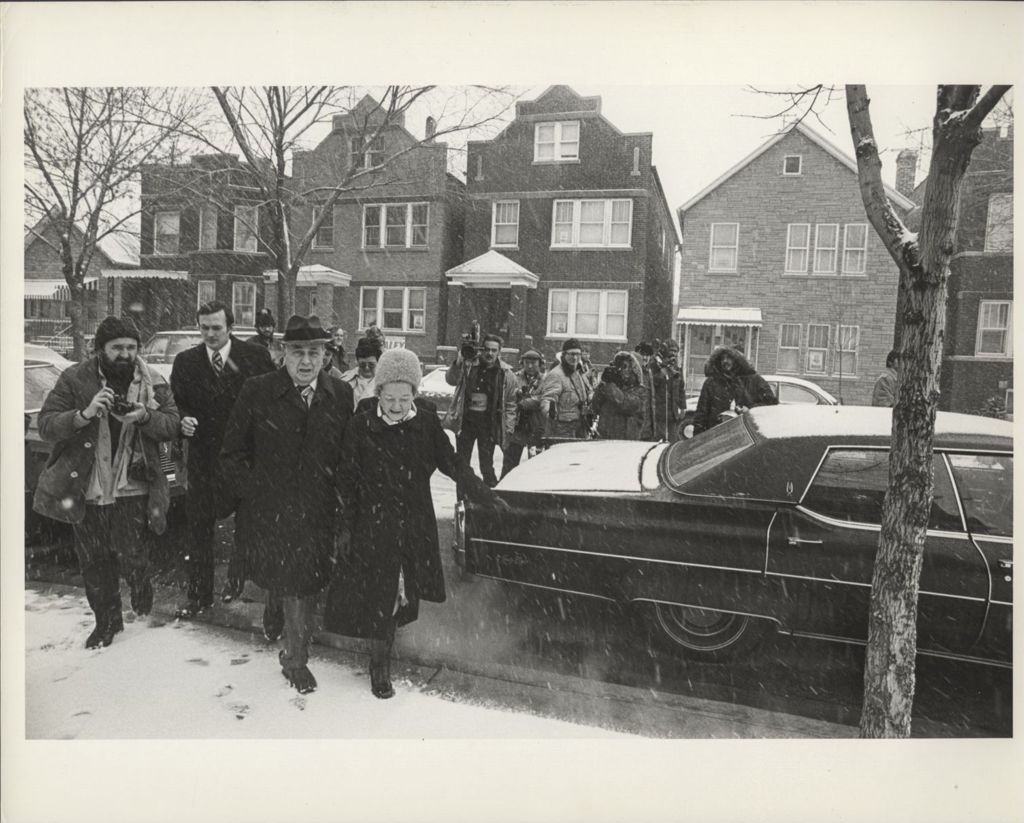 Richard J. Daley and Eleanor Daley walk to their polling place