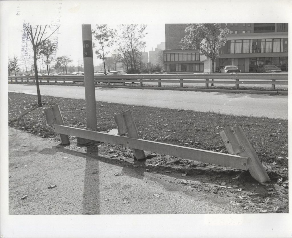 Highway view with damaged guardrail