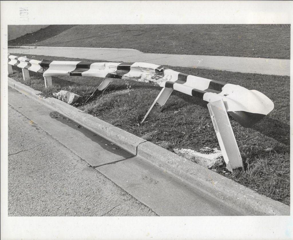 Highway view with damaged guardrail