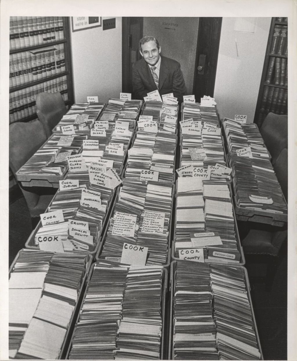 Thomas A. Foran with boxes of petitions
