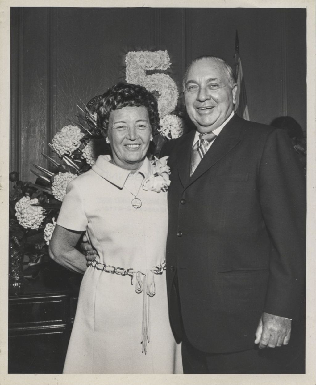 Fifth mayoral inauguration, Eleanor and Richard J. Daley with floral display