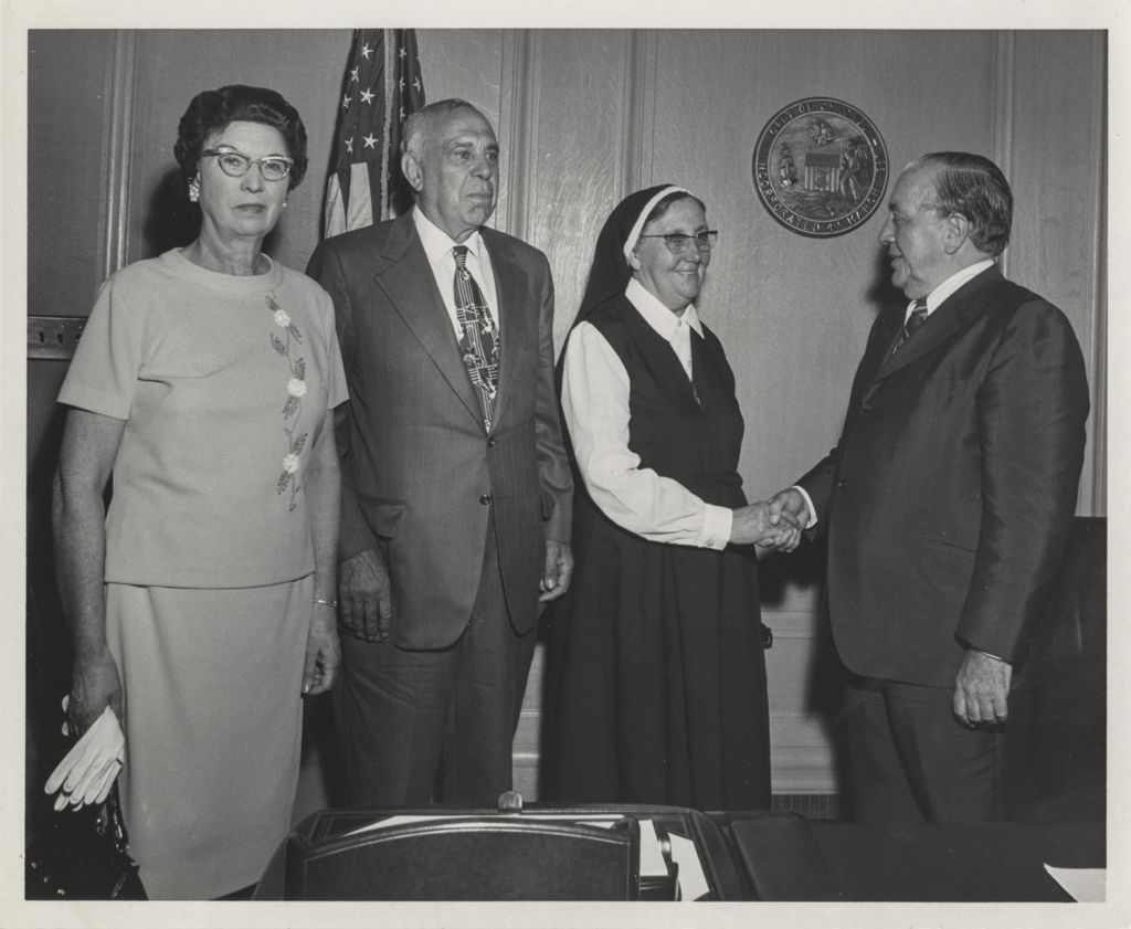 Miniature of Sister Annunciata and others with Richard J. Daley