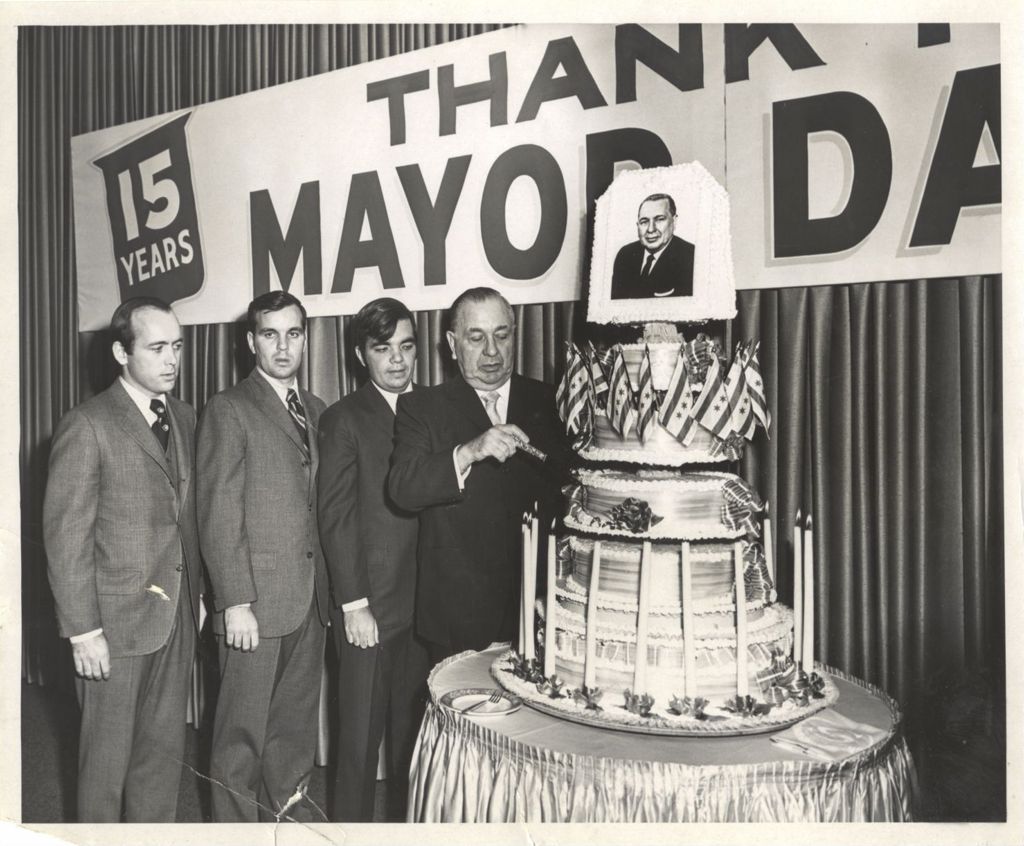 Miniature of Richard J. Daley cutting a celebratory cake