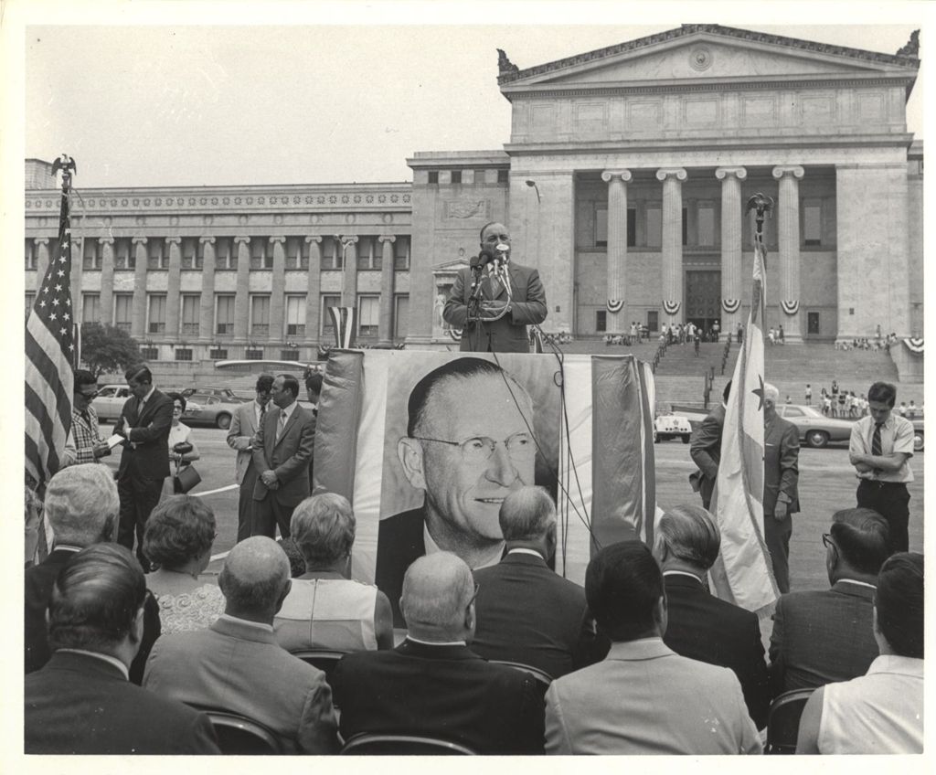 Richard J. Daley speaking at an outdoor podium near the Field Museum