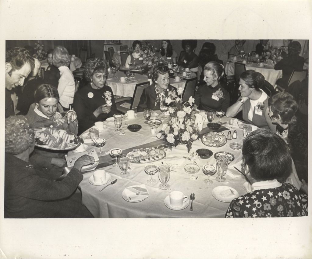 Miniature of Eleanor Daley dining at a "We Care" campaign luncheon