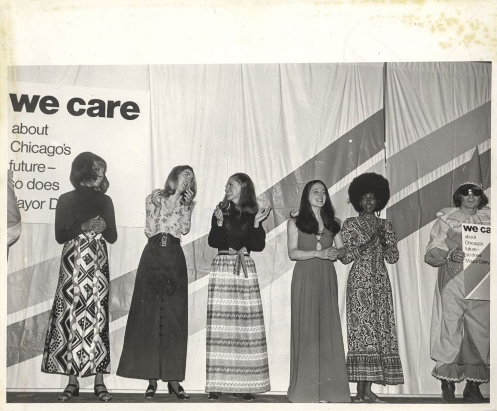 Group of models on stage at a "We Care" event