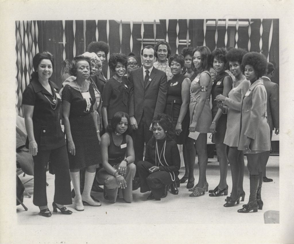 William Daley with a group of women at a "We Care" event