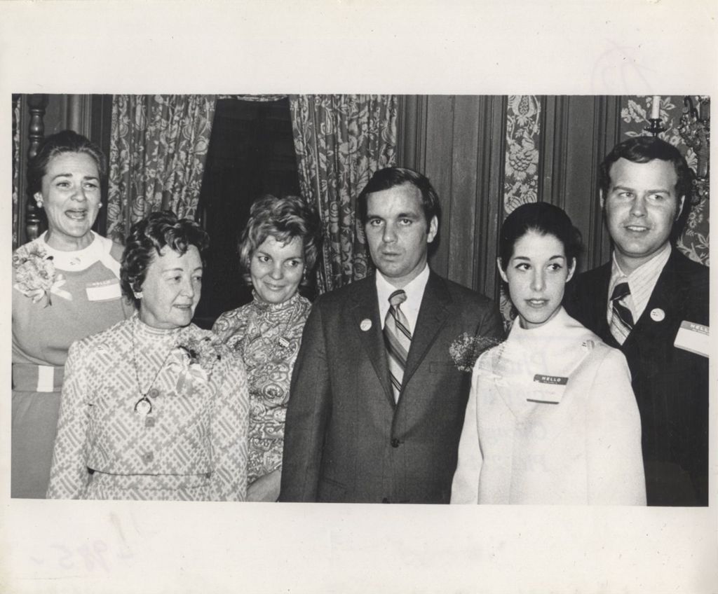 Eleanor Daley, Eleanor R. Daley, and Richard M. Daley with others at a "We Care" event