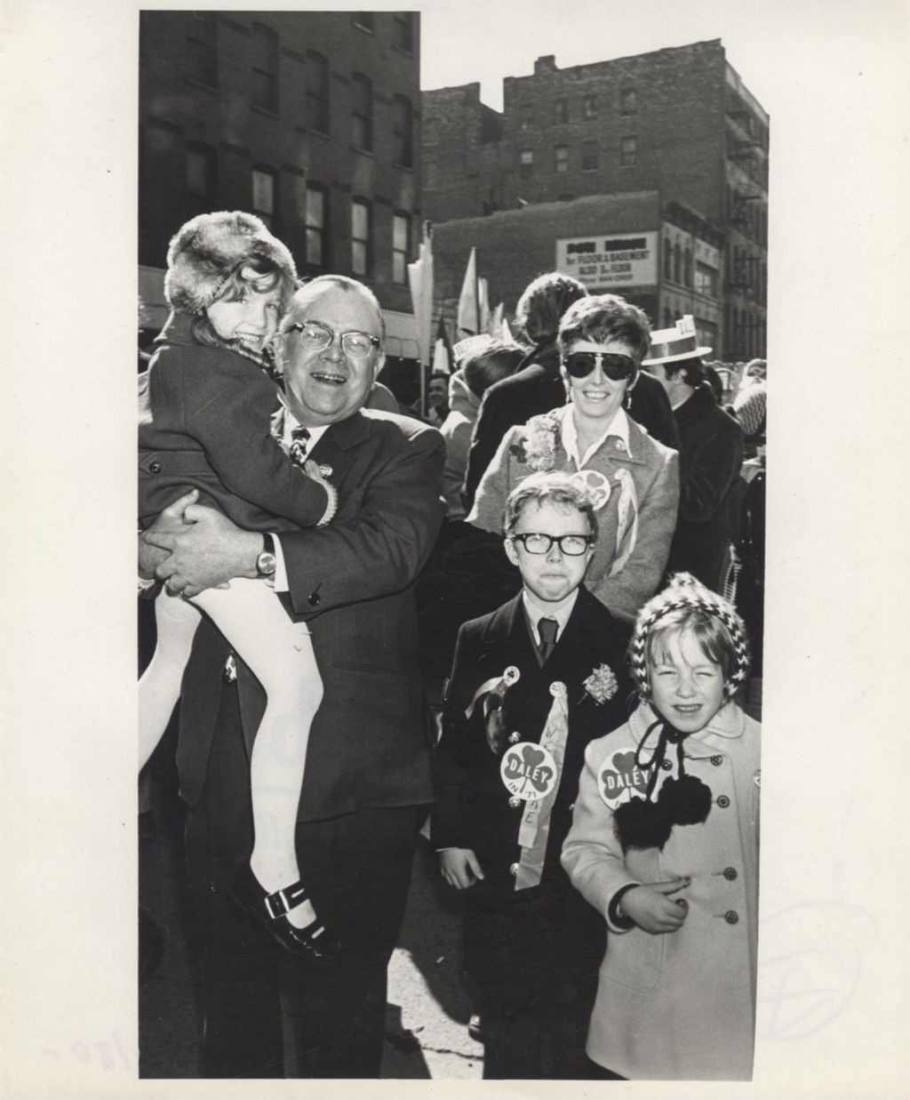 Miniature of Family wearing Daley '71 campaign buttons at a "We Care" event