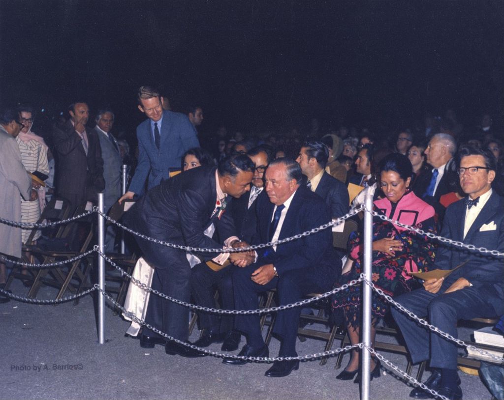 Richard J. Daley with others in an audience