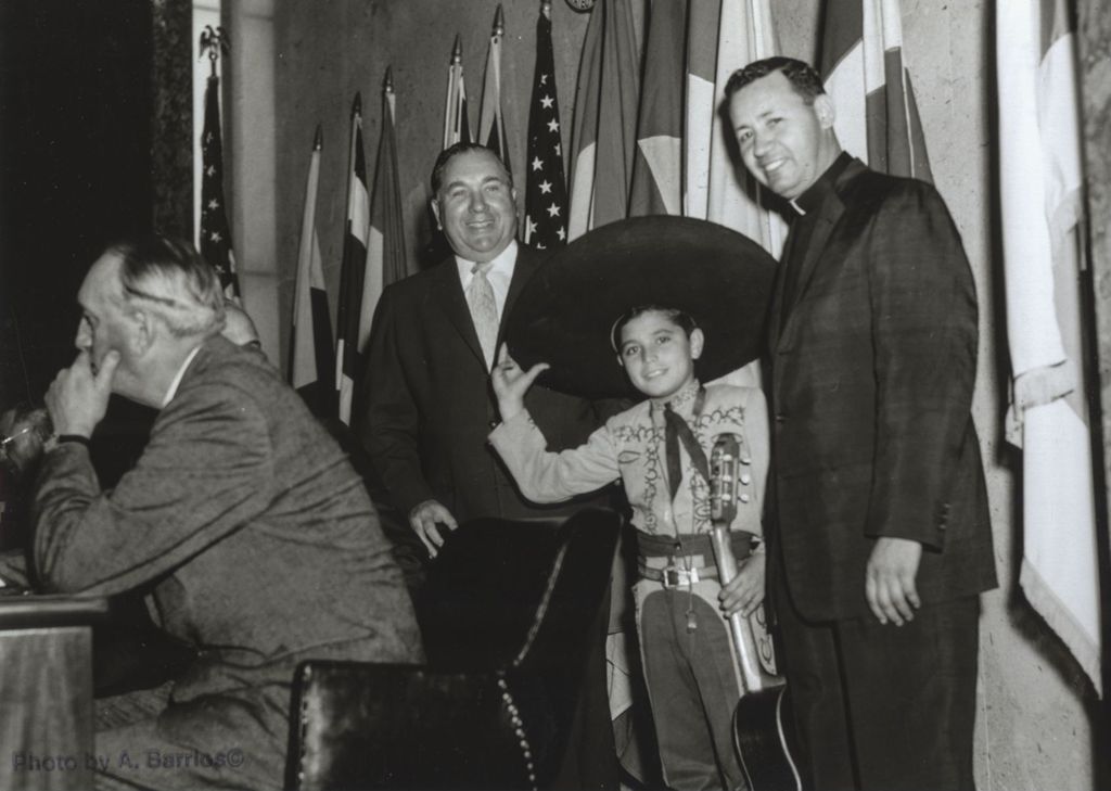 Richard J. Daley with boy and priest promoting Pan American Games