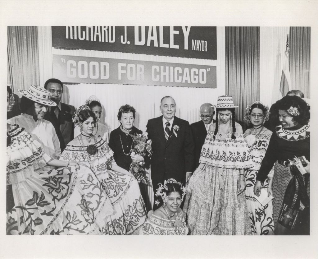 Re-election campaign event, Eleanor and Richard J. Daley with women in ethnic dress