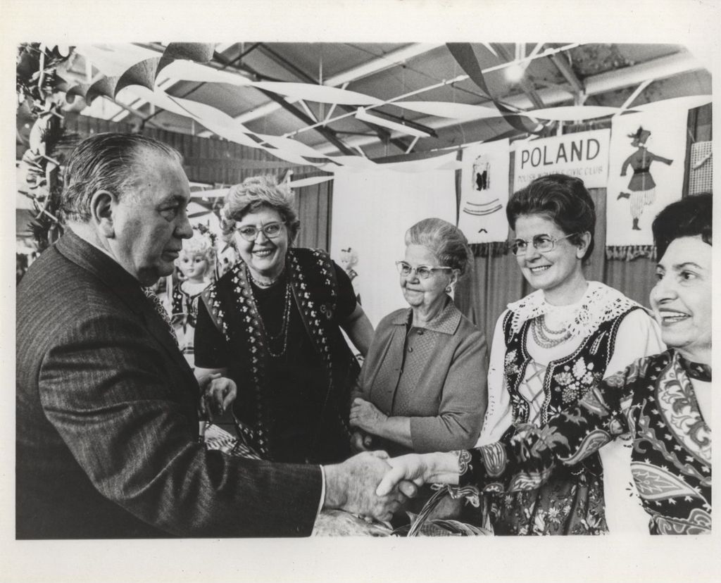 Richard J. Daley at the Polish booth at a Holiday Folk Fair