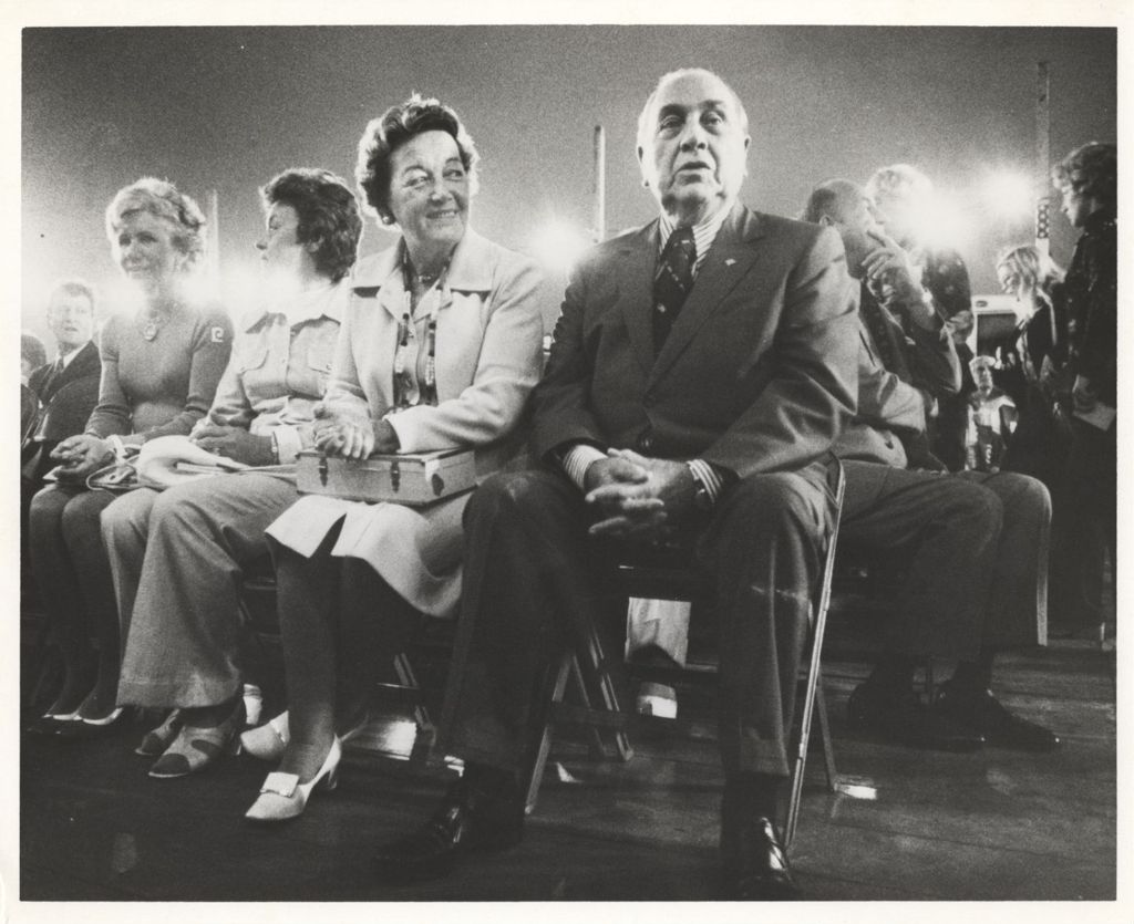 Eleanor and Richard J. Daley seated with others at an event