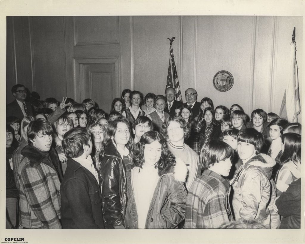 Richard J. Daley with a large group of young people in his office