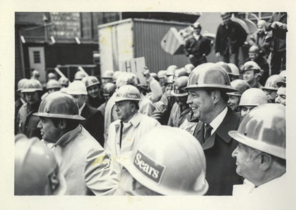 Richard J. Daley with men wearing Sears hard hats