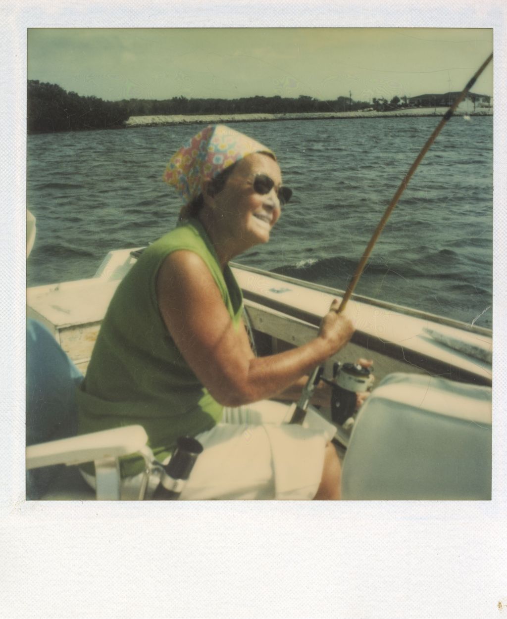 Eleanor Daley fishing from a boat