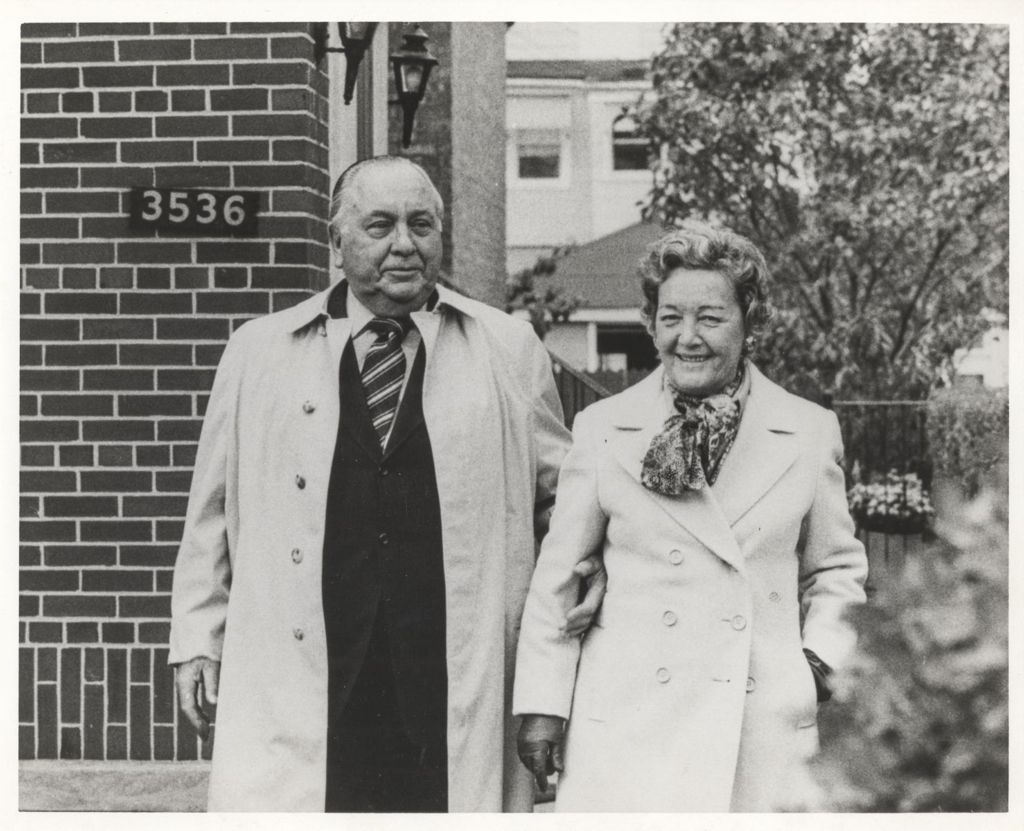 Miniature of Richard J. Daley and Eleanor Daley standing in front of their bungalow