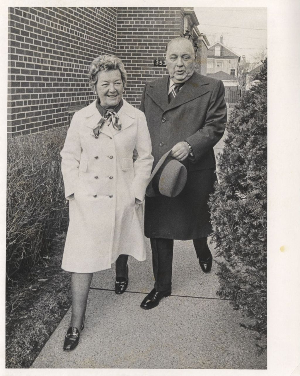 Miniature of Richard J. and Eleanor Daley on the walkway outside their home