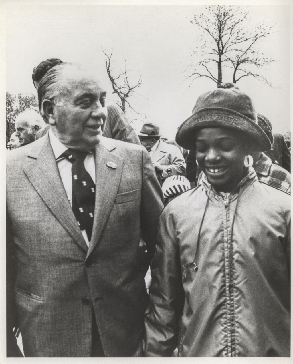 Miniature of Richard J. Daley talking to a young African American girl