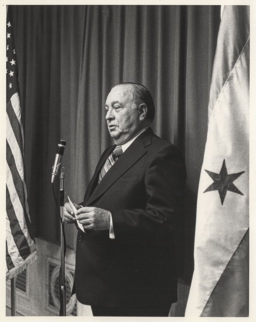 Miniature of Richard J. Daley speaking at a microphone
