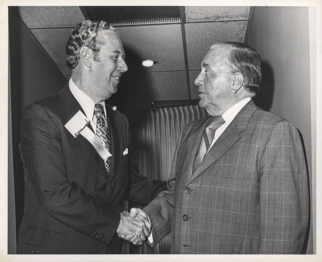 Miniature of Richard J. Daley shaking hands with a man