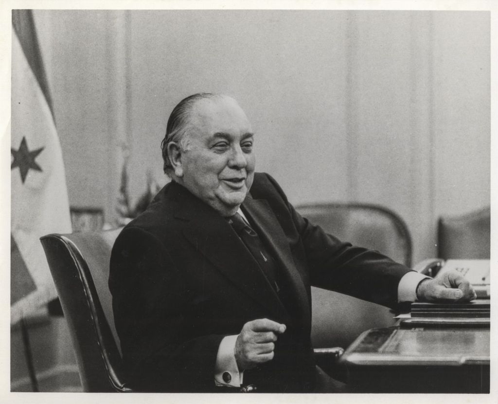 Portrait of Richard J. Daley at press conference in his City Hall office