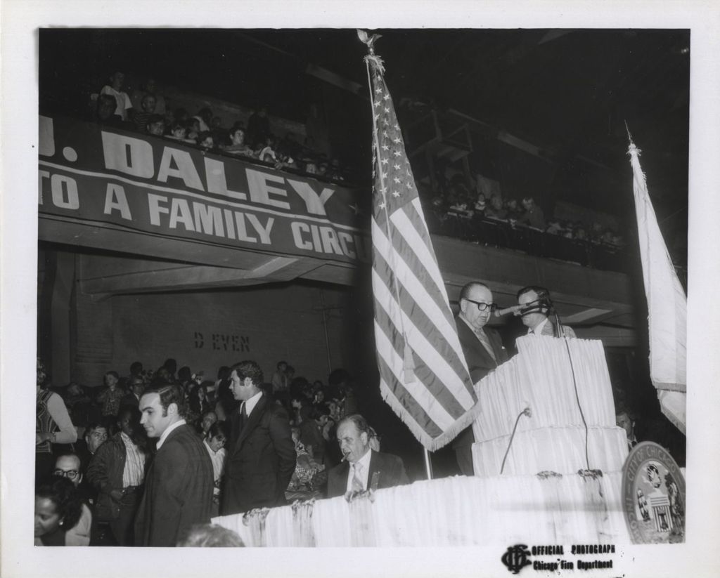 Miniature of Daley "Family Circus" re-election campaign rally, speaker at podium