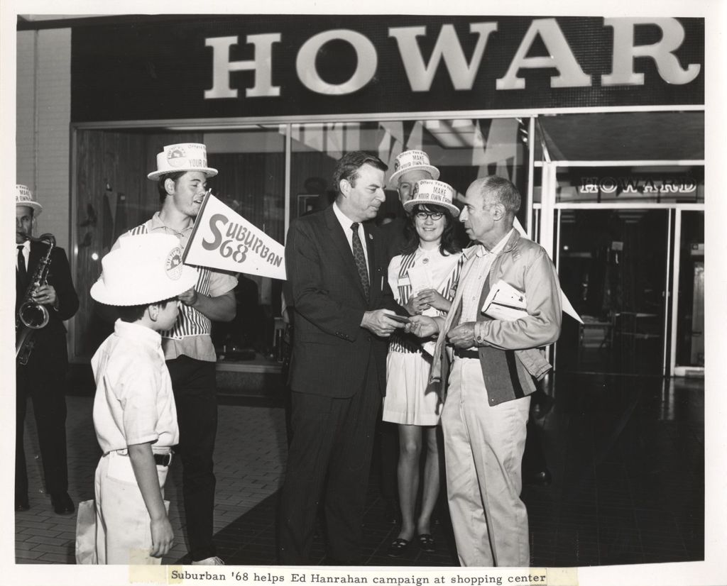 Miniature of Ed Hanrahan and Suburban '68 volunteers greet voters