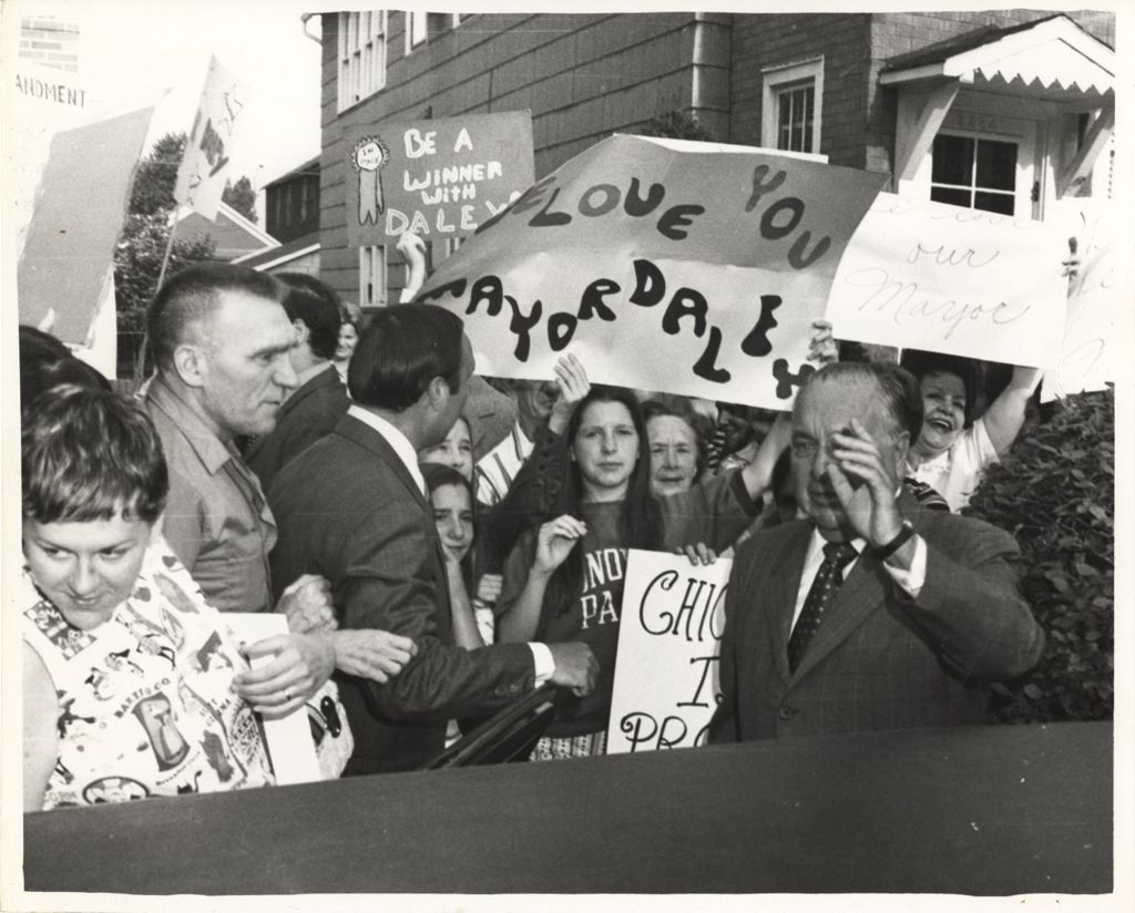 Miniature of Richard J. Daley with supporters outside his home