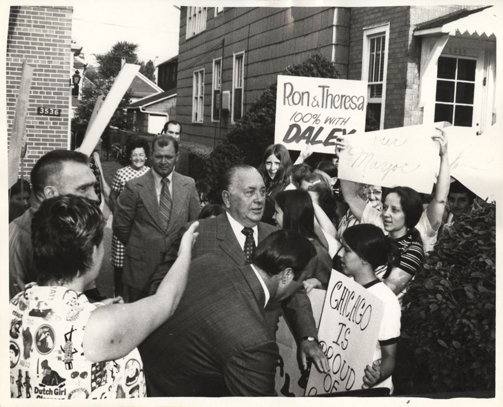 Richard J. Daley with supporters outside his home