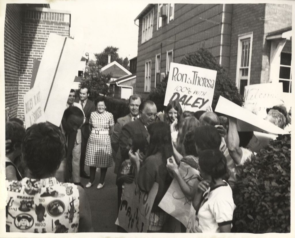 Richard J. Daley with supporters outside his home