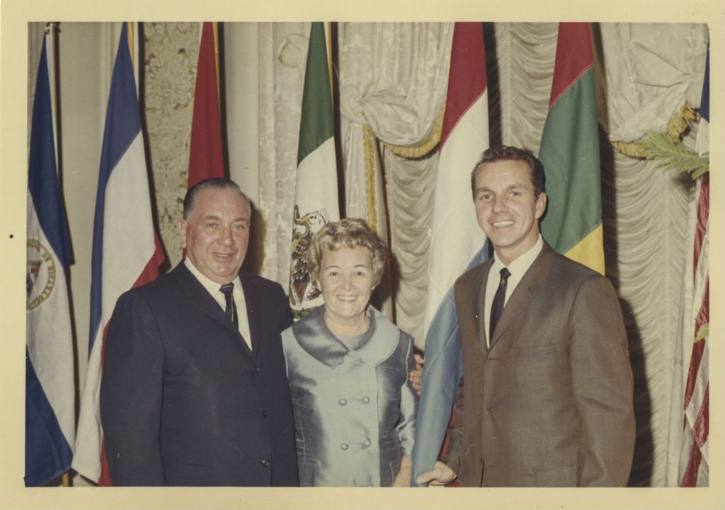 Miniature of Foreign Consul Reception, Richard J. and Eleanor Daley with an attendee