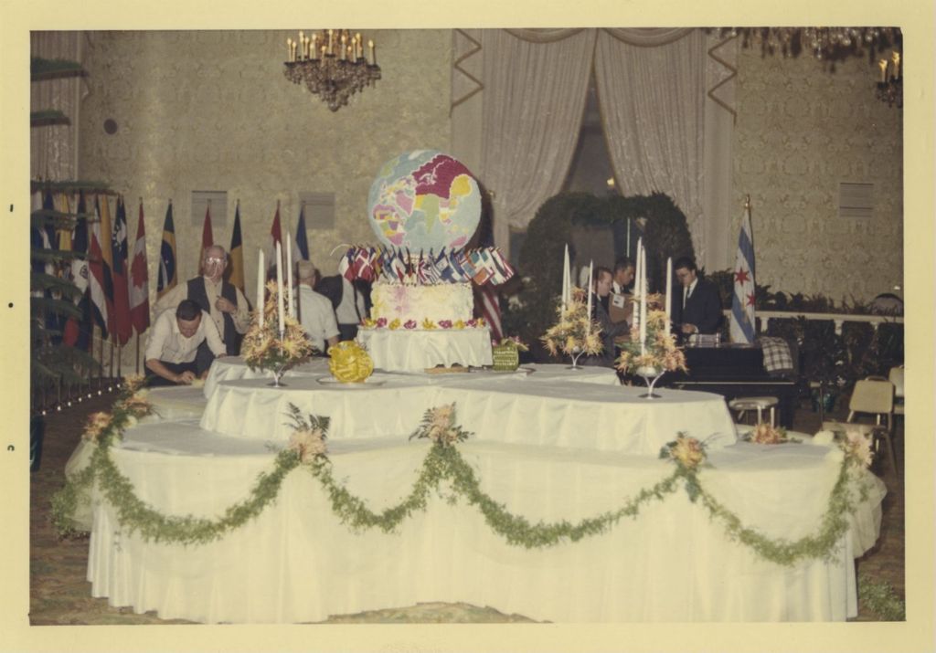 Miniature of Foreign Consul Reception, setting up buffet tables