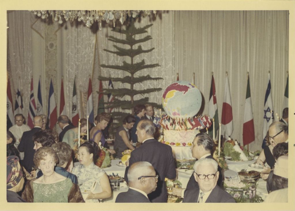 Miniature of Foreign Consul Reception, attendees around buffet tables